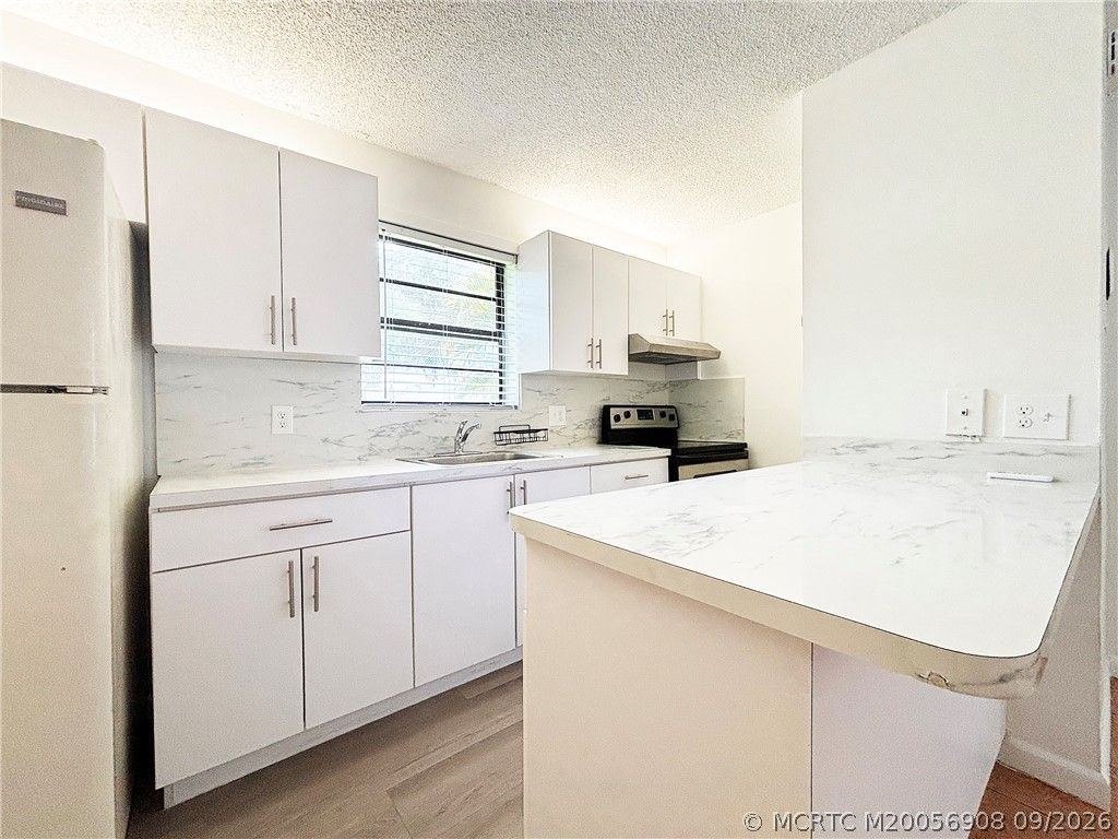 1041 SE Monterey Road , Unit 2-15, Stuart, FL 34994 Photo