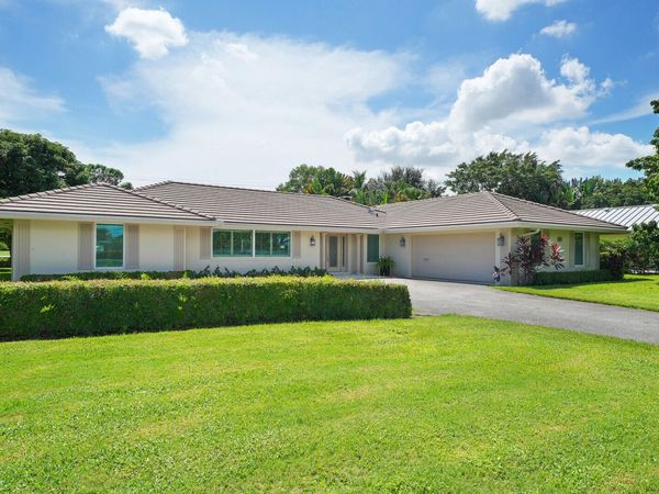 408 S Country Club Drive, Atlantis, FL 33462