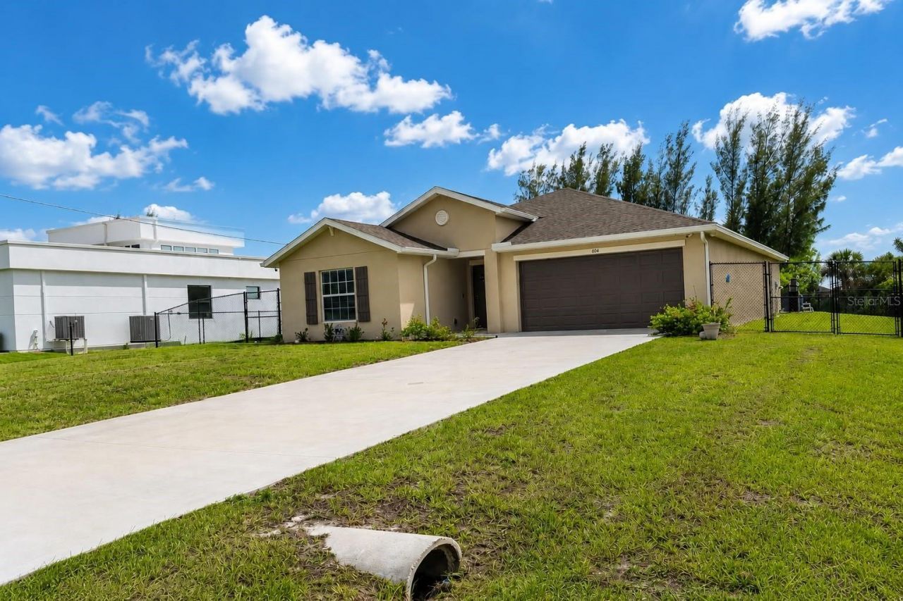 4104 NE 12th Court , Cape Coral, FL 33909 Photo