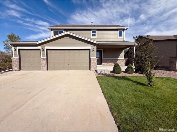 2084 Basil Street , Strasburg, CO 80136