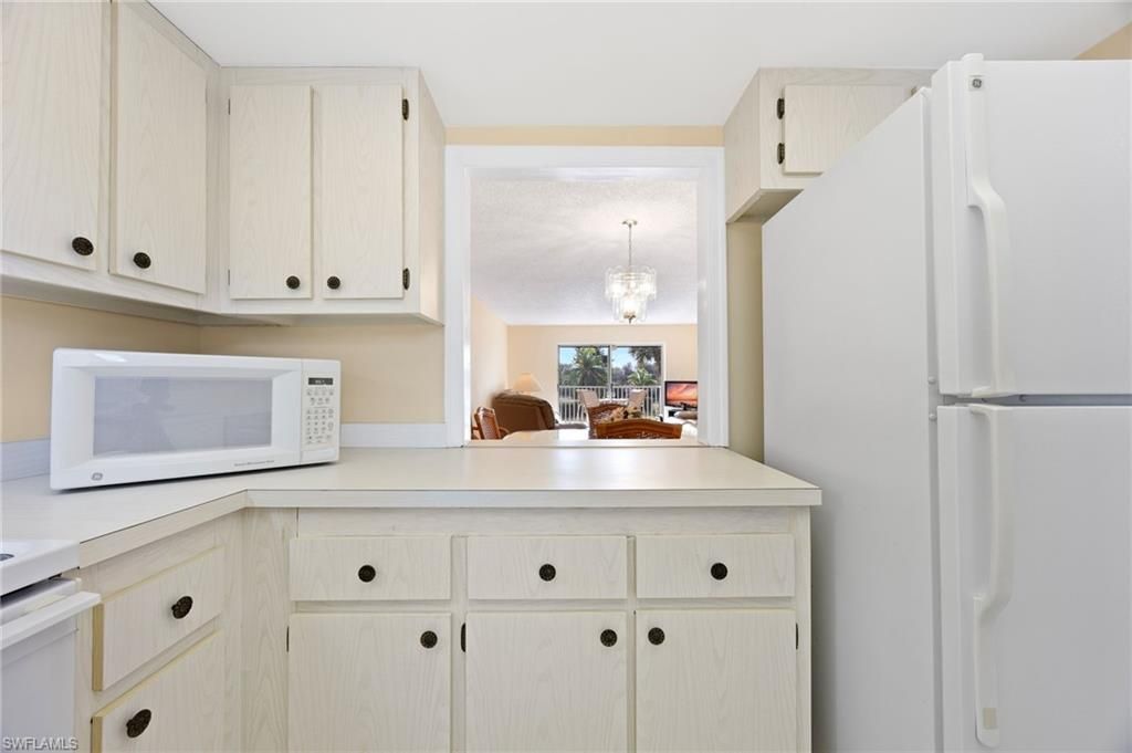 5683 Rattlesnake Hammock Rd , Unit A-202, Naples, FL 34113 Photo