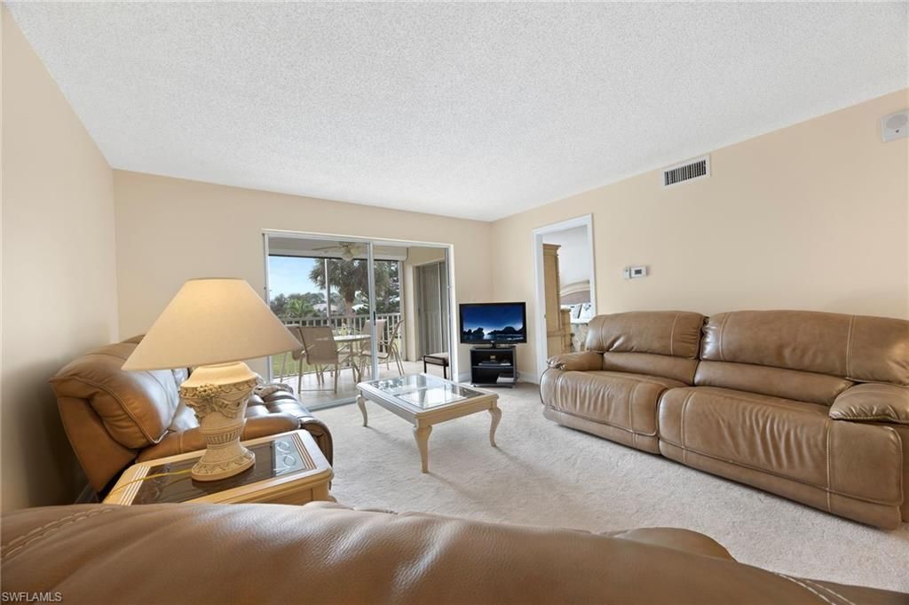 5683 Rattlesnake Hammock Rd , Unit A-202, Naples, FL 34113 Photo