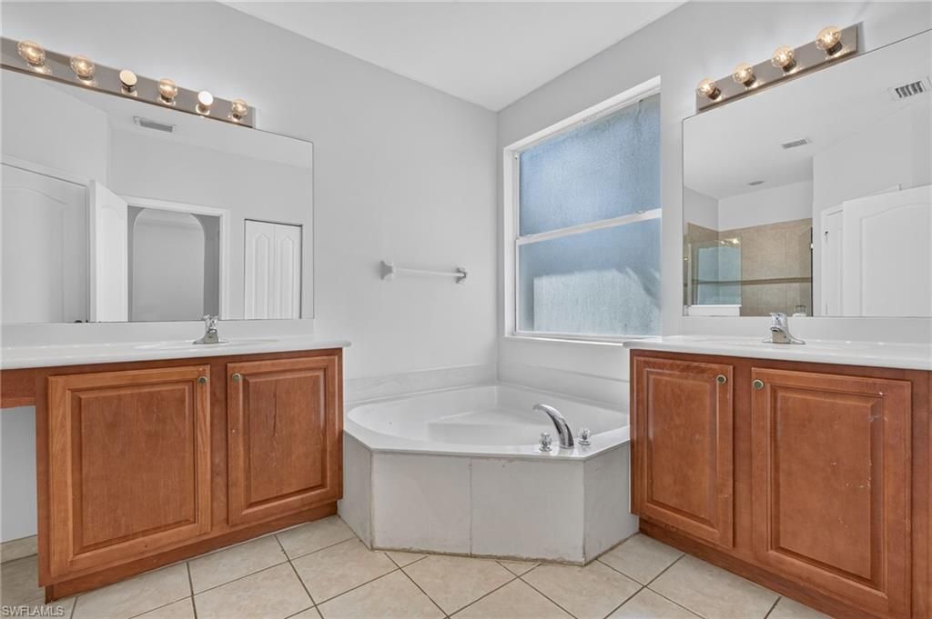 7032 Ambrosia Ln S, Unit 703, Naples, FL 34119 Photo