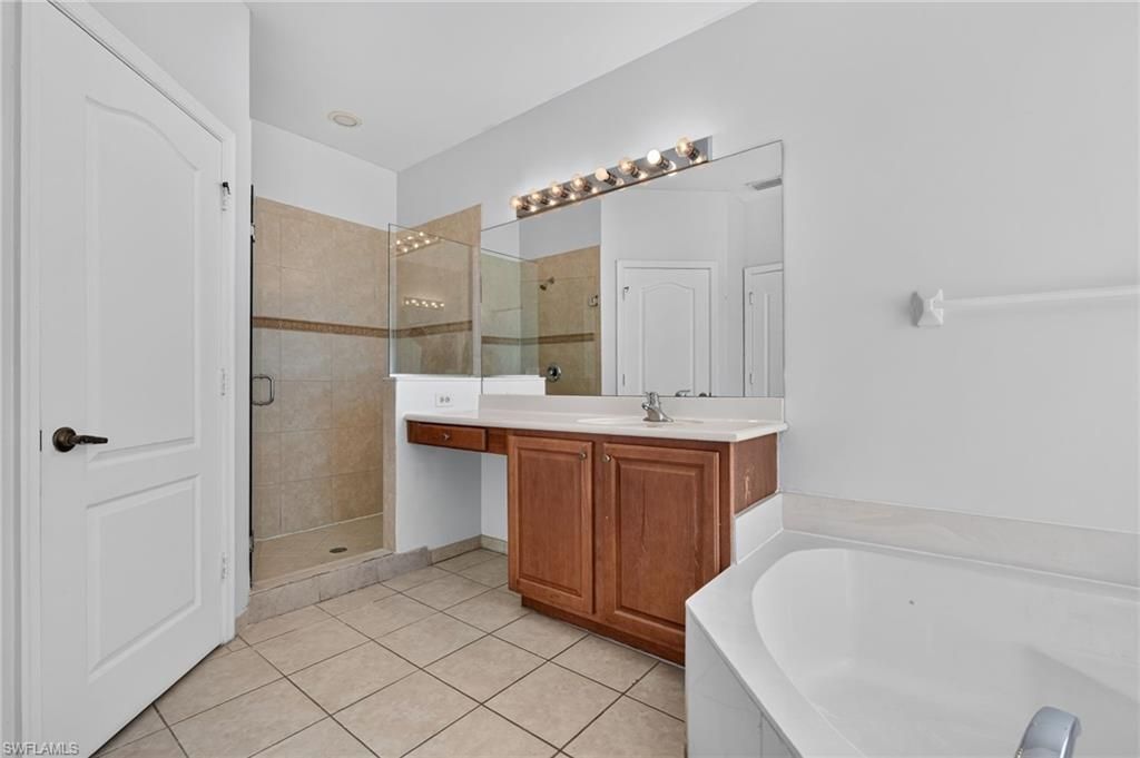 7032 Ambrosia Ln S, Unit 703, Naples, FL 34119 Photo