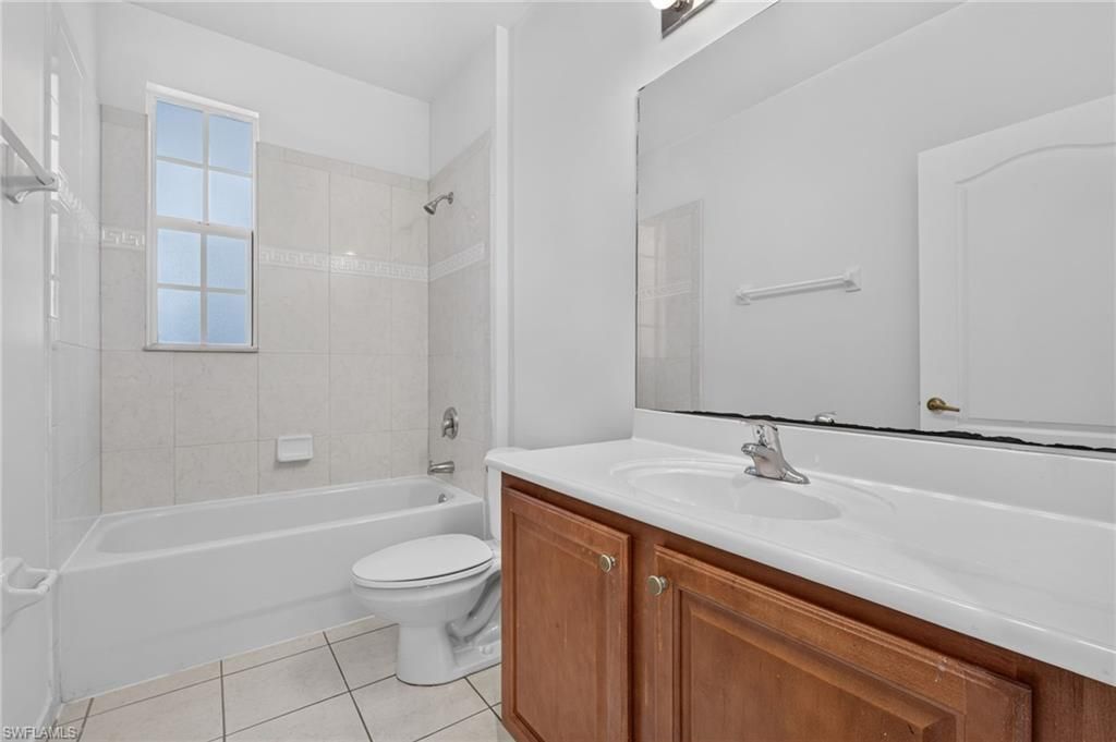 7032 Ambrosia Ln S, Unit 703, Naples, FL 34119 Photo
