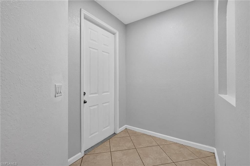 7032 Ambrosia Ln S, Unit 703, Naples, FL 34119 Photo