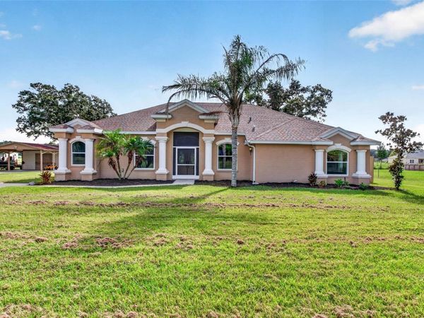 3412 WOLFE ROAD , ZEPHYRHILLS, FL 33541