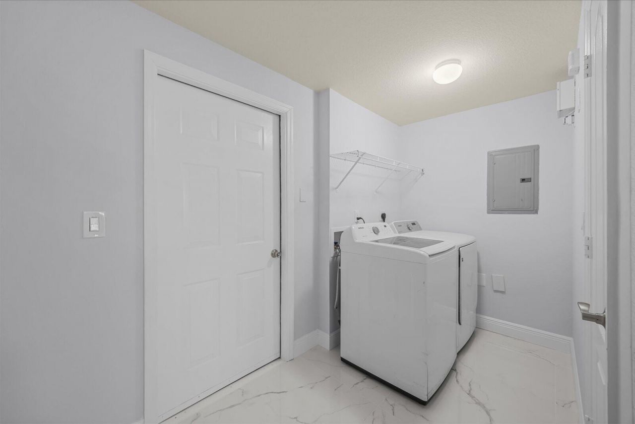 128 SW Peacock Boulevard, Unit 15-101, Port Saint Lucie, FL 34986 Photo