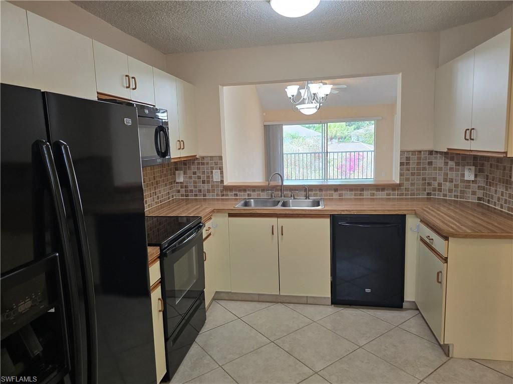 5741 Whitaker Rd , Unit D203, Naples, FL 34112 Photo