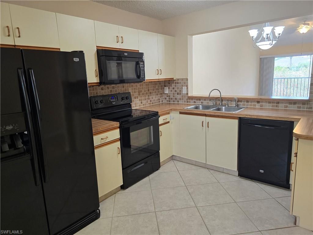 5741 Whitaker Rd , Unit D203, Naples, FL 34112 Photo
