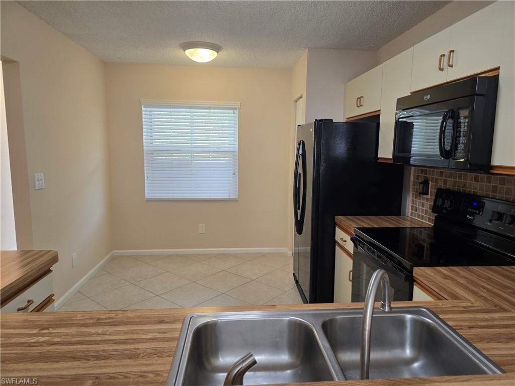 5741 Whitaker Rd , Unit D203, Naples, FL 34112 Photo