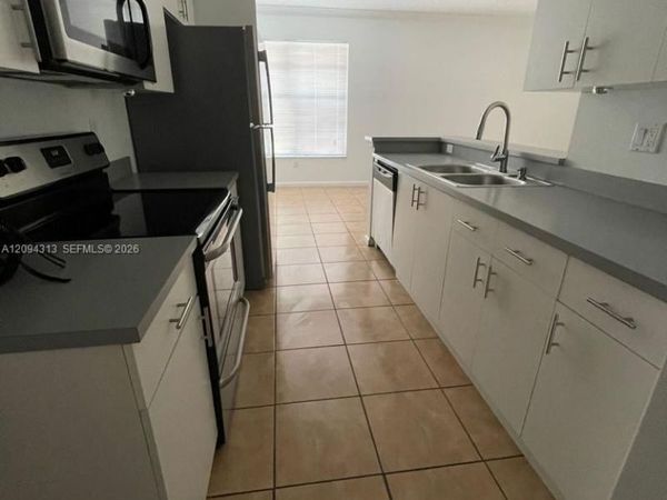5840 W Sample Rd , Unit 105, Coral Springs, FL 33067