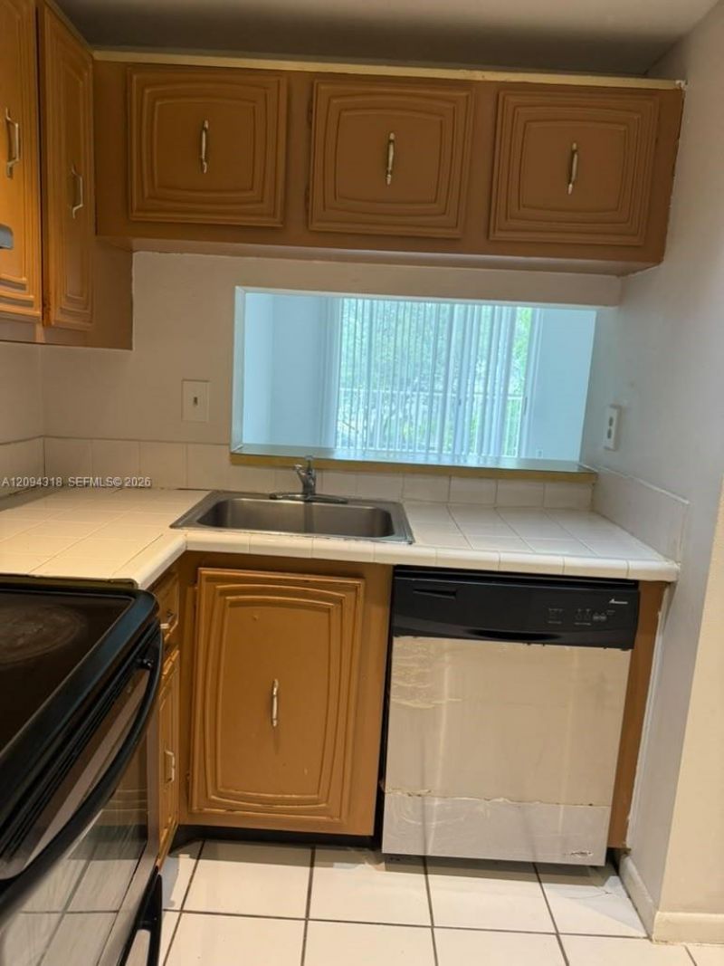 484 NW 165th St Rd , Unit A-311, Miami, FL 33169 Photo