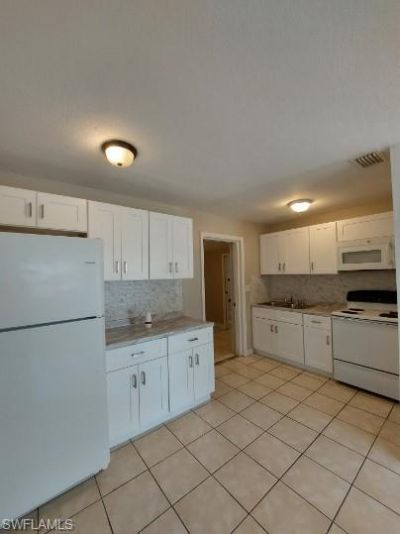 722 W Cleveland Ln, Lehigh Acres, FL 33936 Photo