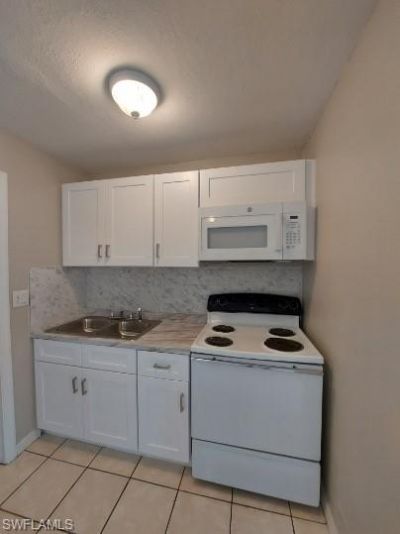 722 W Cleveland Ln, Lehigh Acres, FL 33936 Photo