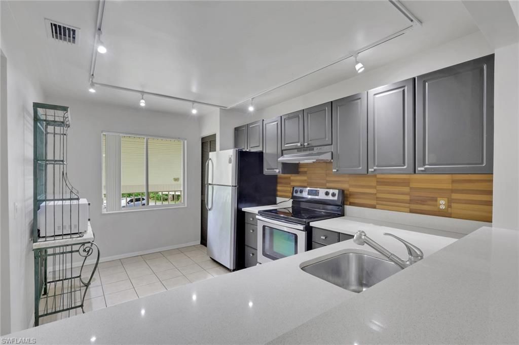 5634 Woodmere Lake Cir , Unit B203, Naples, FL 34112 Photo