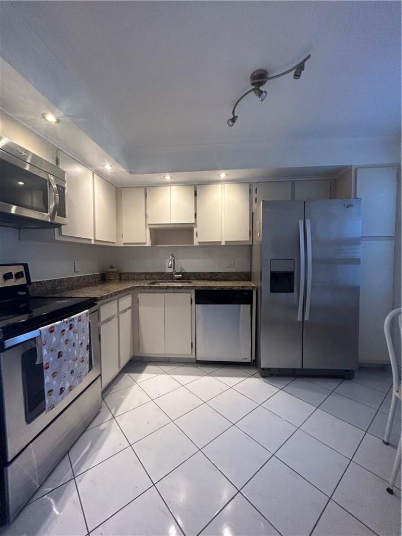 3970 Oaks Clubhouse Drive, Unit 310, Pompano Beach, FL 33069 Main Photo