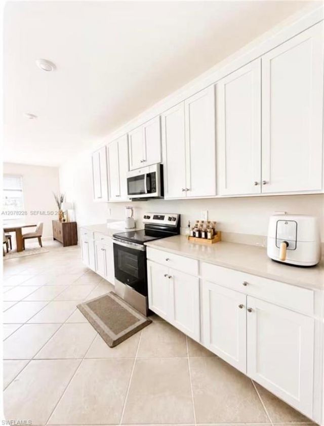 9291 Aqua Overlook Ct, Lehigh Acres, FL 33936 Photo