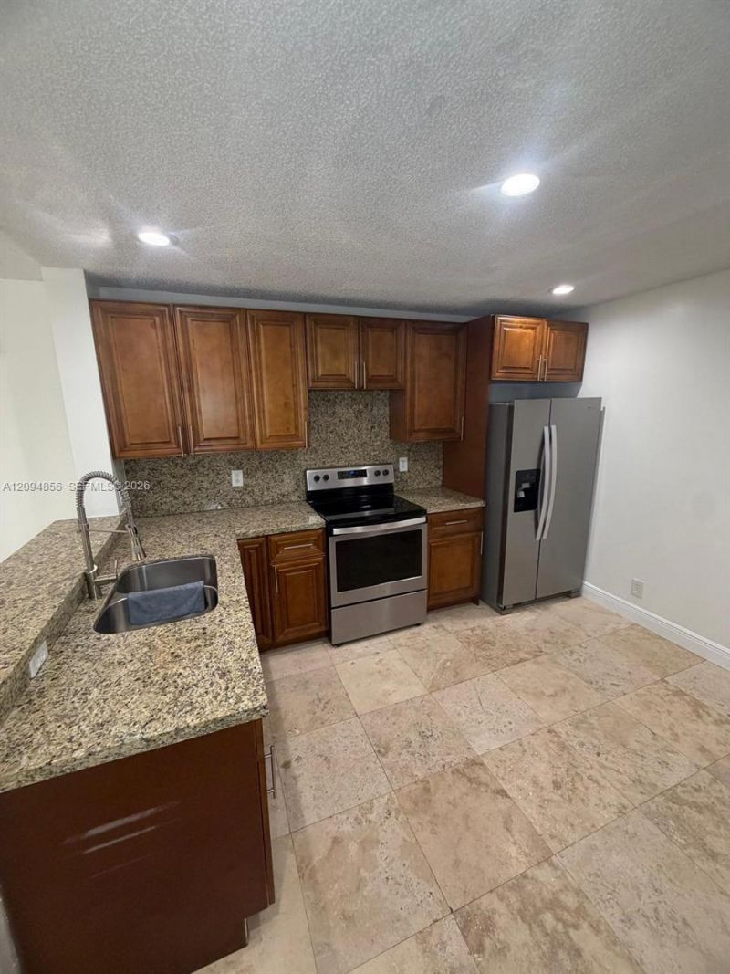 10125 W Sunrise Blvd , Unit 303, Plantation, FL 33322 Photo