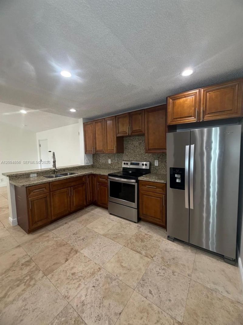 10125 W Sunrise Blvd , Unit 303, Plantation, FL 33322 Photo