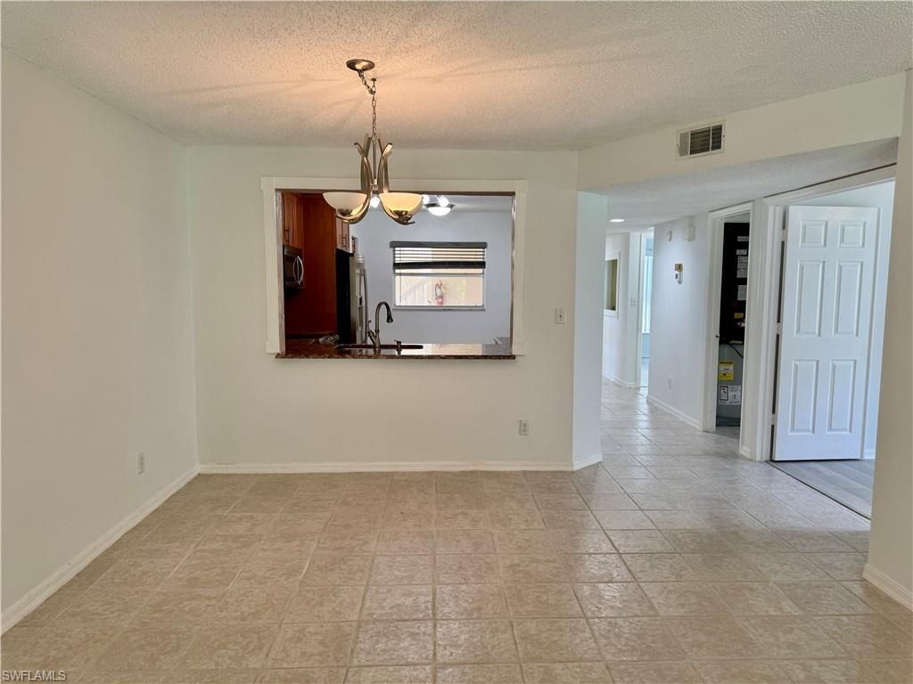 661 Squire Cir, Unit 101, Naples, FL 34104 Photo