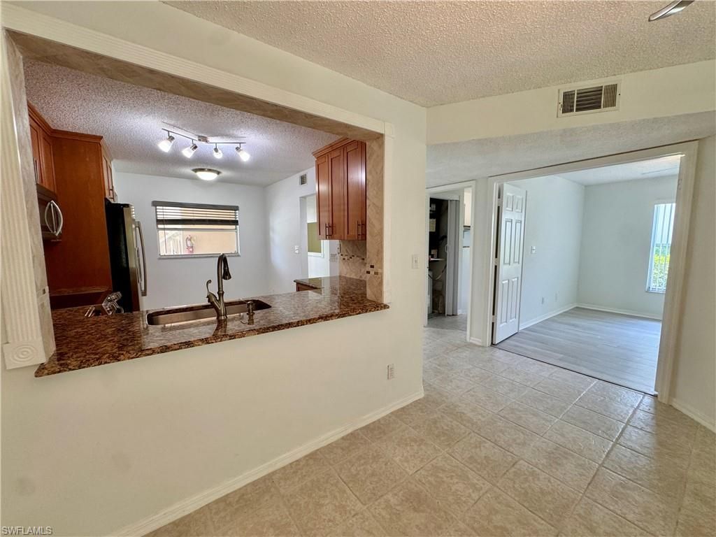 661 Squire Cir , Unit 101, Naples, FL 34104 Photo
