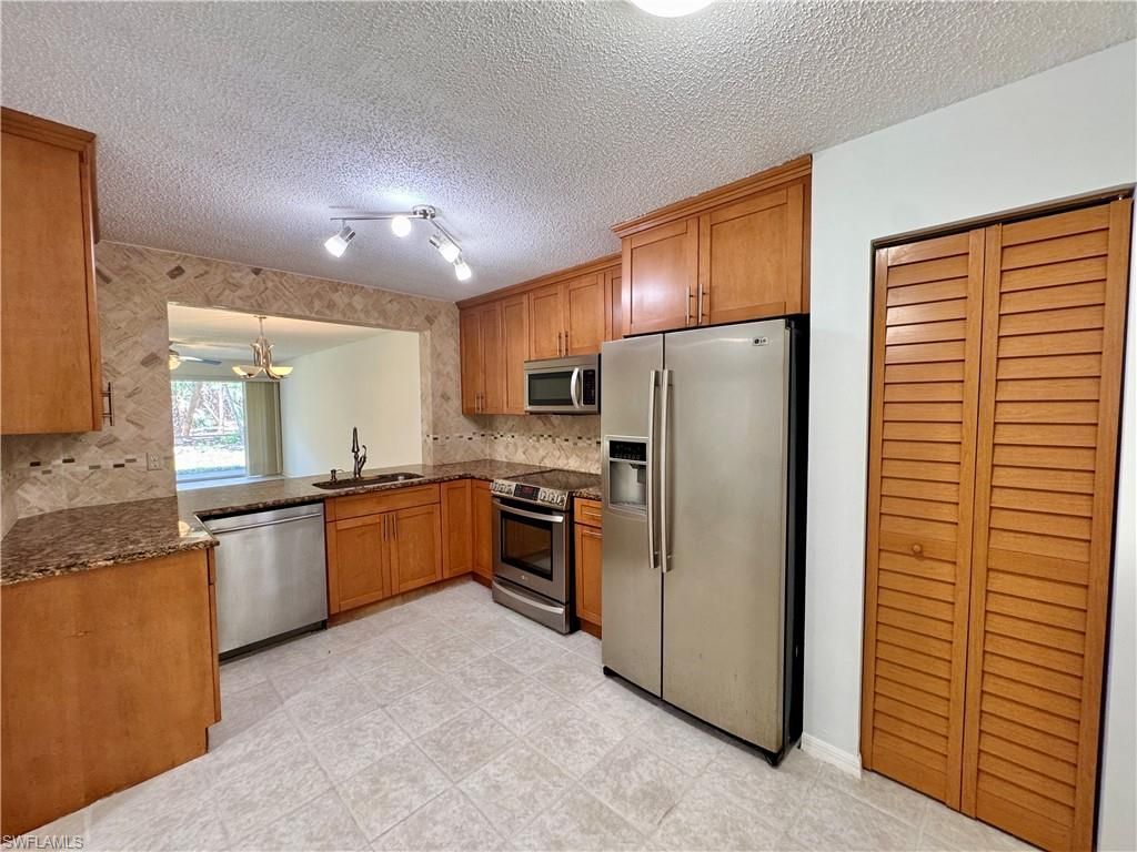 661 Squire Cir, Unit 101, Naples, FL 34104 Photo