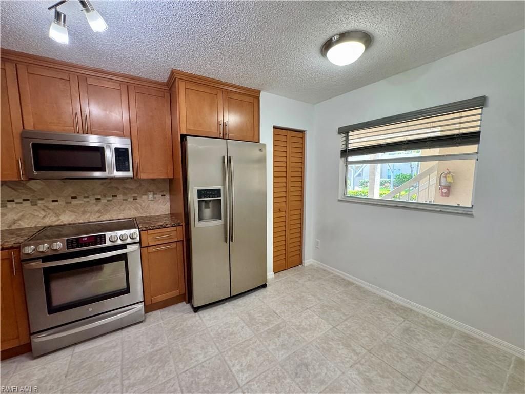 661 Squire Cir , Unit 101, Naples, FL 34104 Photo