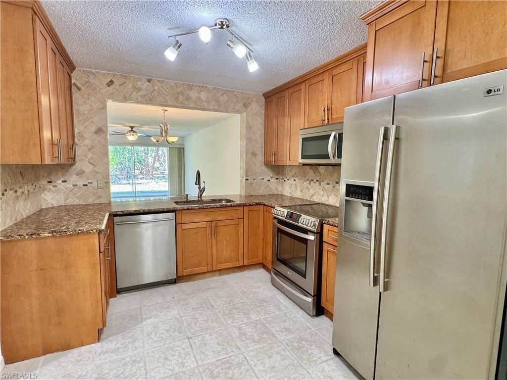 661 Squire Cir , Unit 101, Naples, FL 34104 Photo