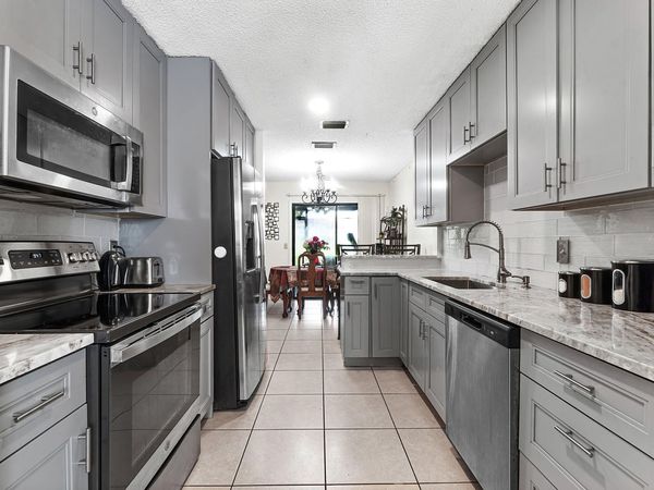1595 Woodbridge Lakes Circle, West Palm Beach, FL 33406