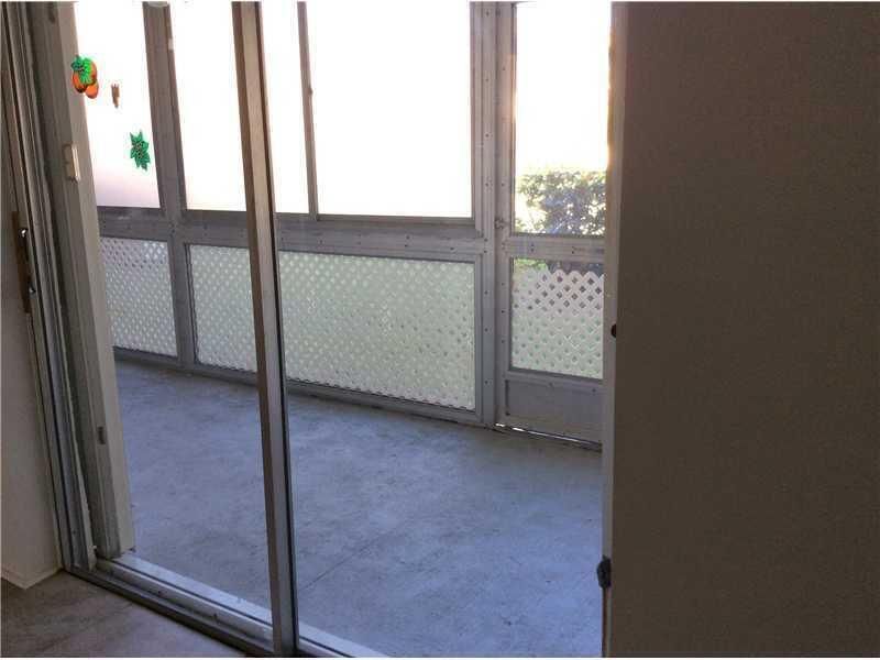 500 Village Green Circle W, Unit 107, Palm Springs, FL 33461 Photo