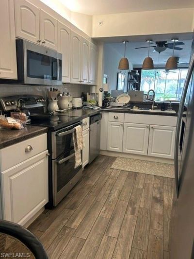 7564 Silver Trumpet Ln , Unit 102, Naples, FL 34109 Photo