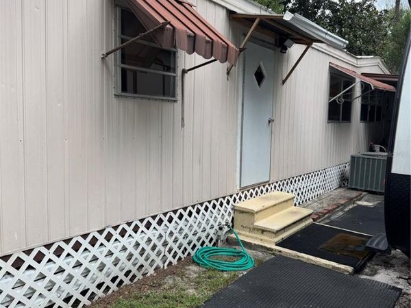 902 MONTANA AVENUE, LUTZ, FL 33548