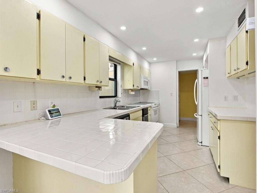 845 Collier Ct, Unit 203, Marco Island, FL 34145 Photo