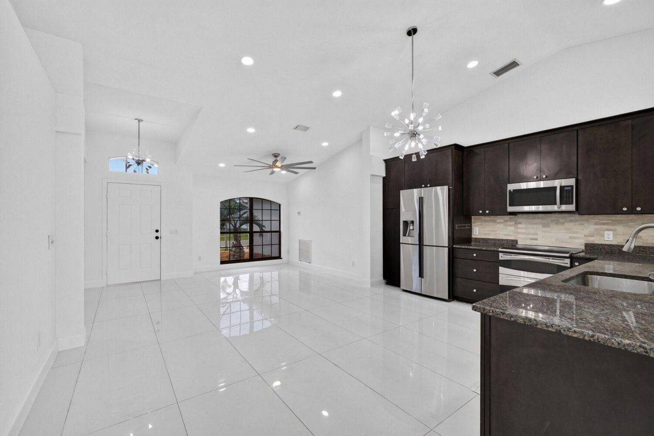 3721 SW Masilunas Street, Port Saint Lucie, FL 34953 Photo