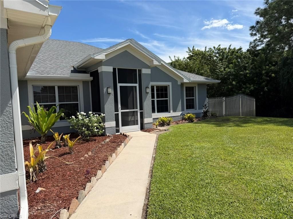 702 Calvin Ave, Lehigh Acres, FL 33972 Photo