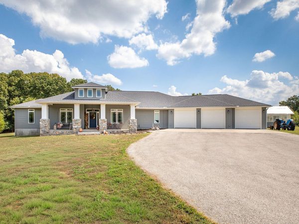 1125 Honeysuckle Street , Lowell, AR 72745