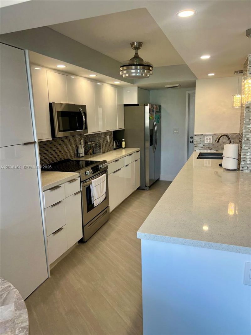 100 Golden Isles Dr , Unit 205, Hallandale Beach, FL 33009 Photo