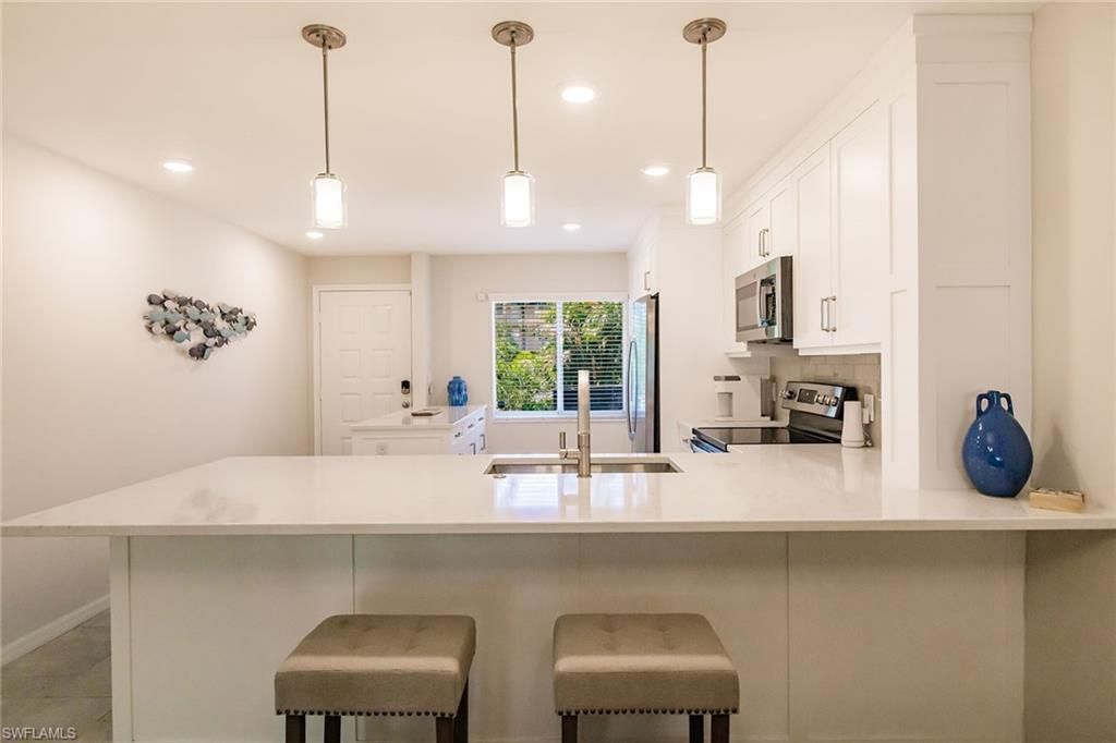 3032 Sandpiper Bay Cir, Unit G102, Naples, FL 34112 Photo