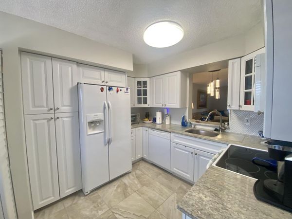 7281 Amberly Lane, Unit 404, Delray Beach, FL 33446