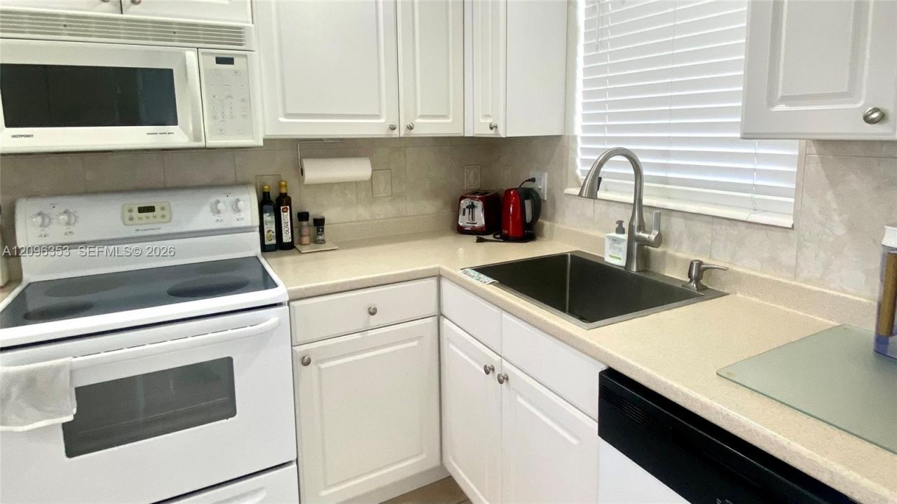 410 Golden Isles Dr, Unit 407, Hallandale Beach, FL 33009 Photo