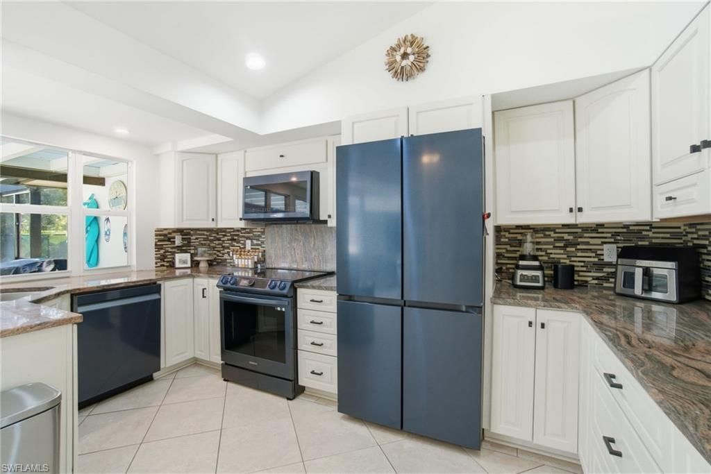 560 Cypress Way E, Naples, FL 34110 Photo