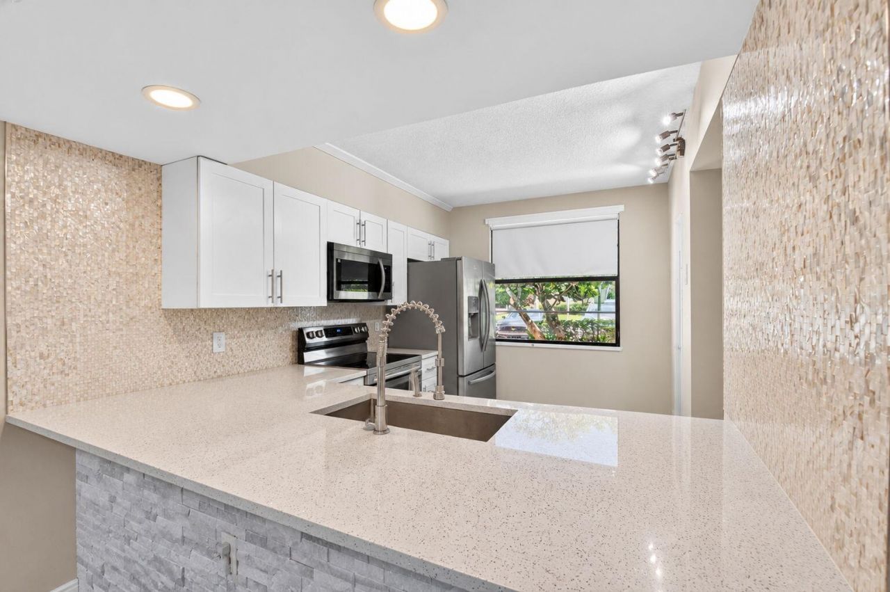 3507 Village Boulevard, Unit 105, West Palm Beach, FL 33409 Photo