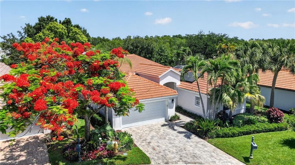 1523 Whispering Oaks Cir, Naples, FL 34110 Photo