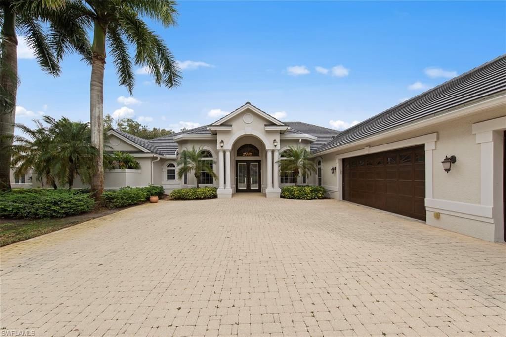 9235 The Ln , Naples, FL 34109 Photo