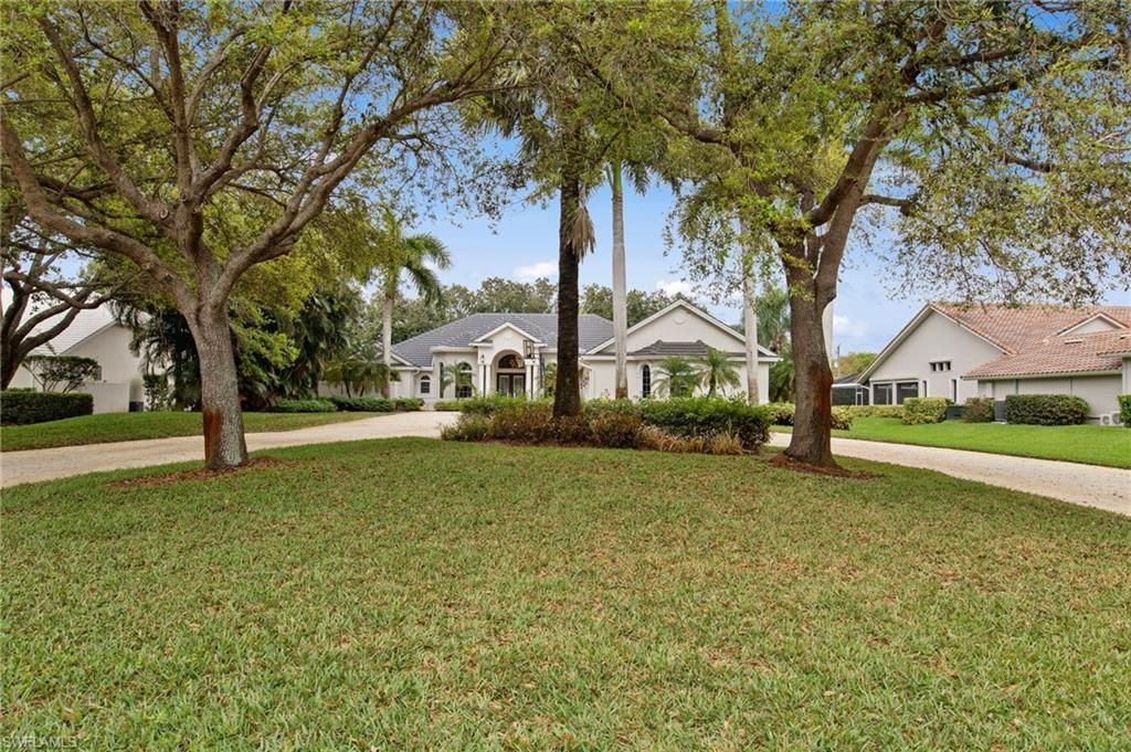 9235 The Ln , Naples, FL 34109 Photo