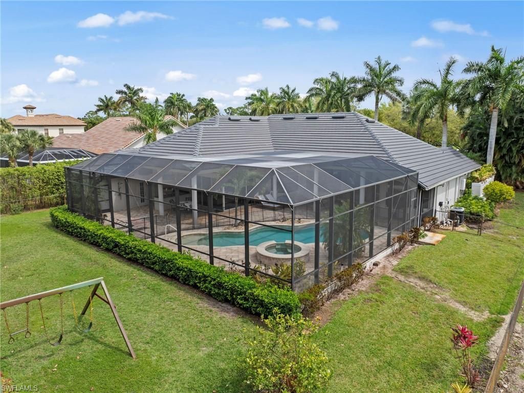9235 The Ln , Naples, FL 34109 Photo