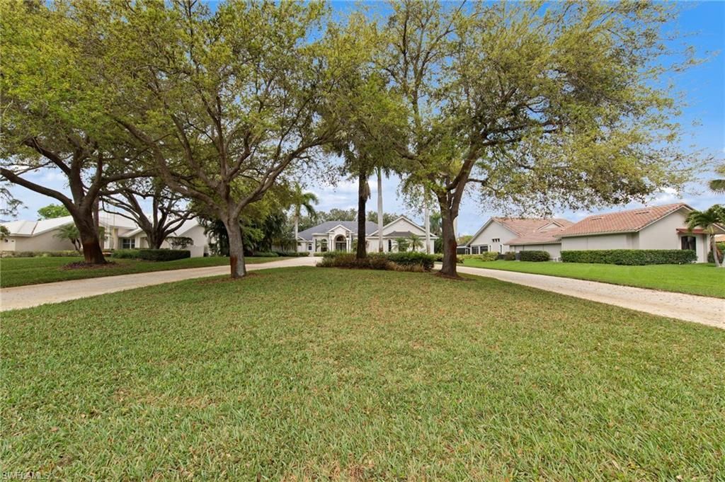 9235 The Ln , Naples, FL 34109 Photo