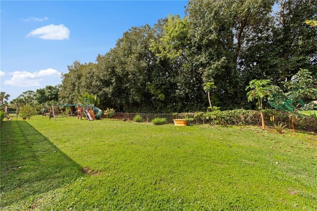 9235 The Ln , Naples, FL 34109 Photo