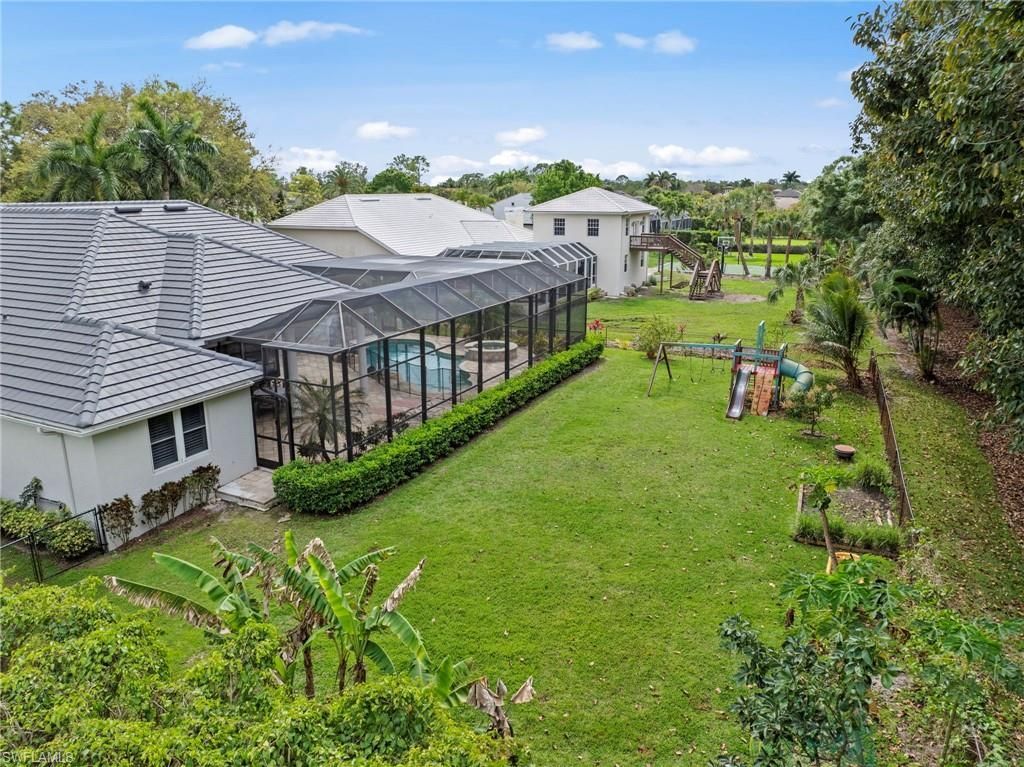 9235 The Ln , Naples, FL 34109 Photo